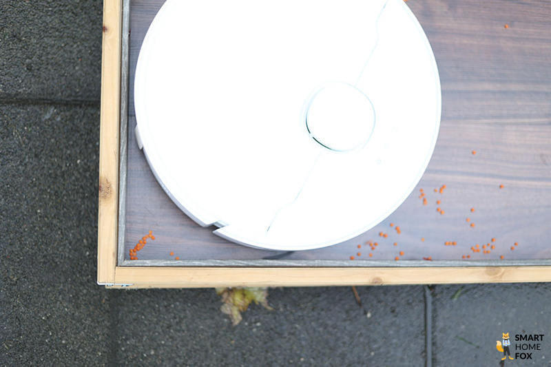 The Dreame L10s Ultra is cleaning a corner.